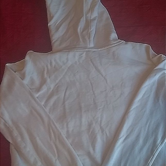 A white sweater from h&m with the wording "dream team" - Picture 2 of 2